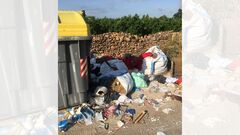 Restos depositados al lado de un contenedor.